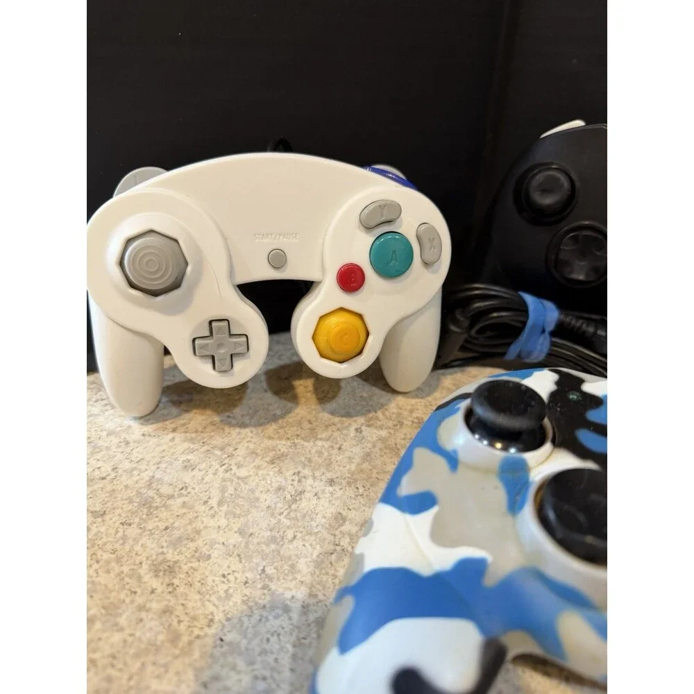 Lot of 7 Mixed Video Game Controllers GameCube Xbox PS Untested Pelican GameStop